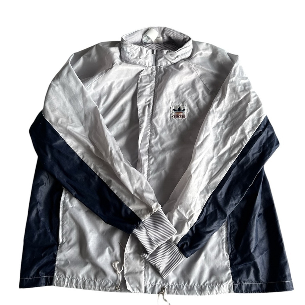 Vintage Adidas Originals Men Windbreaker In Grey and Navy Hidden Hood From 80’s
